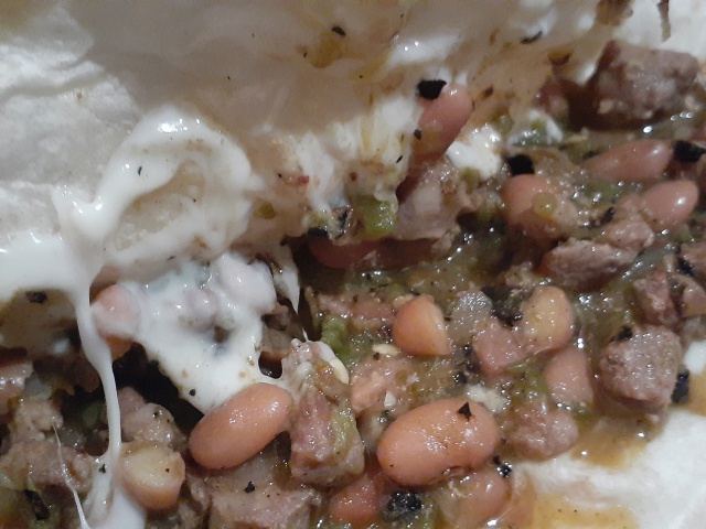Queso derretido en quesadilla de Arriero